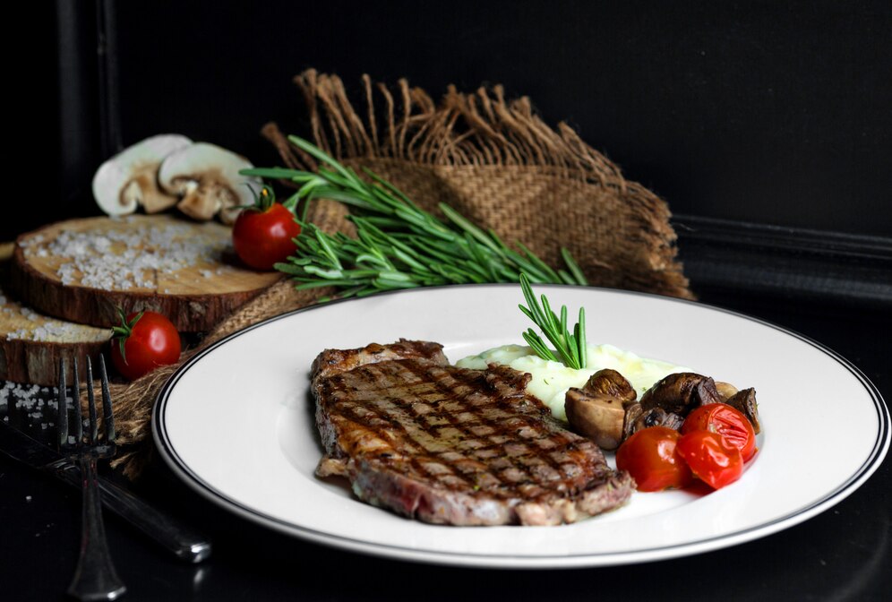 beef steak served with rice mushroom tomato 140725 1491